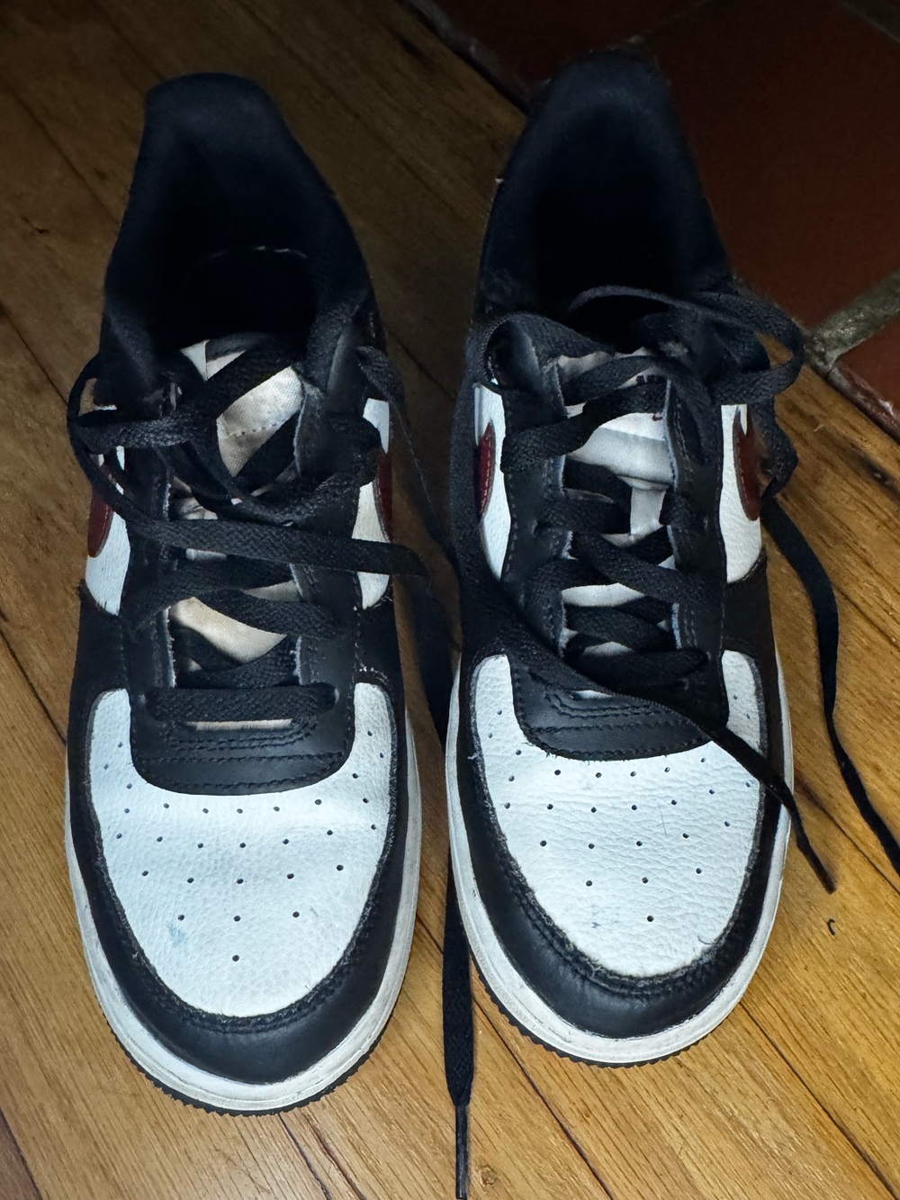 BigNike Air Force 1 '07 in the "Black, Summit White, and Dark Team Red"